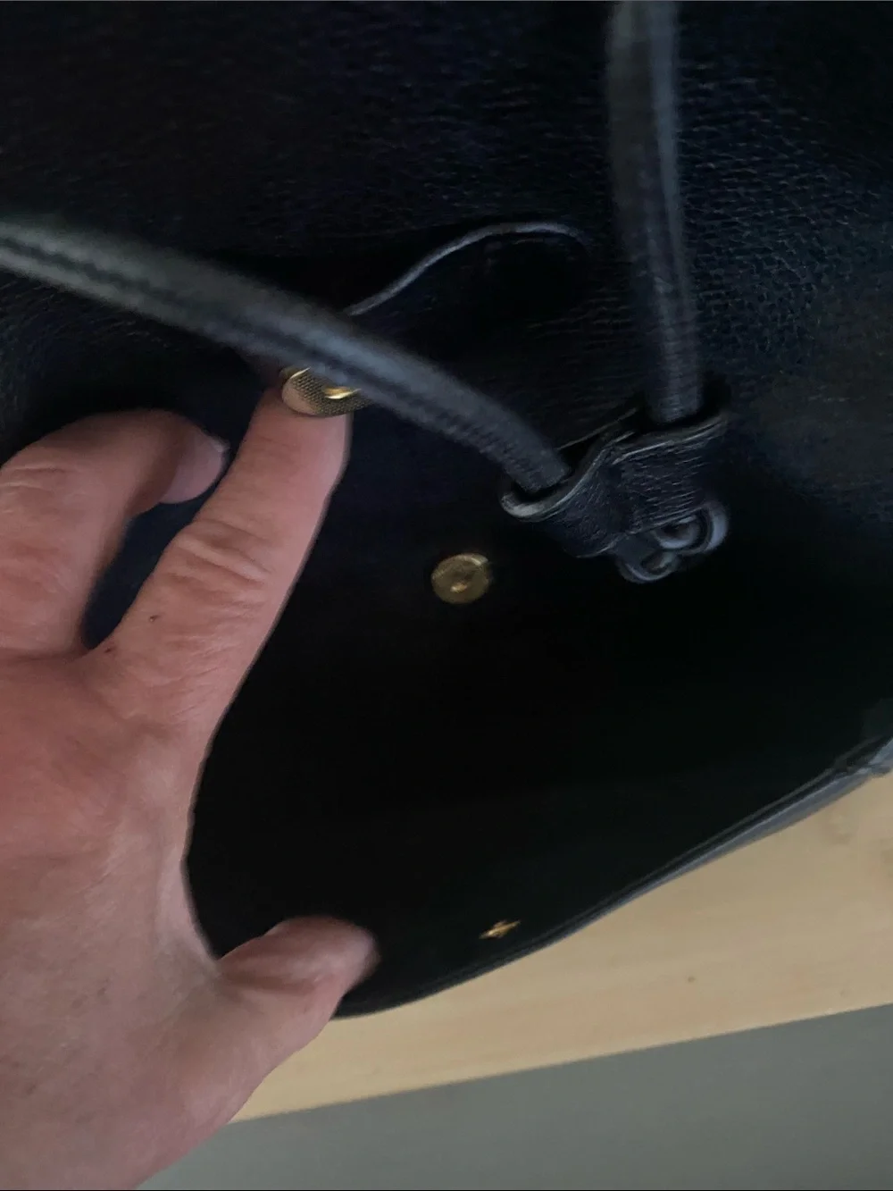 MCM Black Pebbled Leather Backpack with Gold Emblem Hardwarer